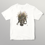 A white short-sleeve crewneck t-shirt featuring an anti-war Wry Bird graphic print of a vintage gas mask filled with colorful wildflowers, displayed against a neutral gray background.