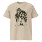 A beige short-sleeve crewneck t-shirt featuring a black ink-style graphic of a weeping tree with a hugging figure at its base, shown against a plain white background.