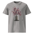 A heather gray Wry Bird short-sleeve crewneck t-shirt featuring a graphic print of a tree with colorful pink, purple, and white blossoms growing out of a dark barrel, shown against a plain white background.